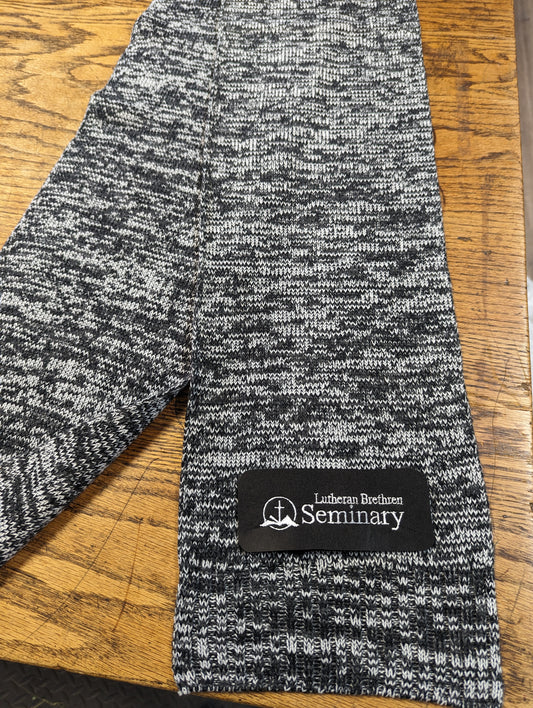 Sport-Tek® Marled Scarf with embroidery patch.  Color of patch and stitching will be determined by the color of the fabric.